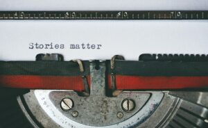 Typewriter with "Stories Matter" on page